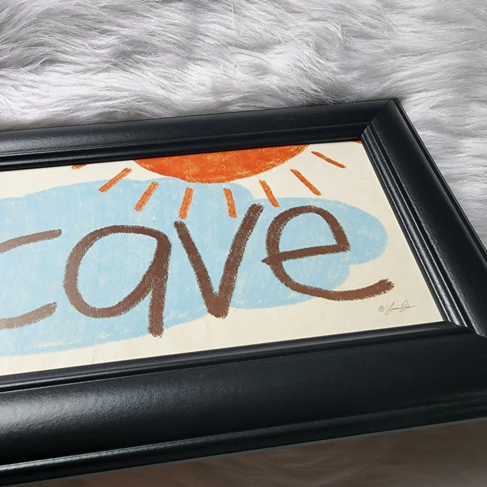 Lauren Rader Kid‎ Cave black framed art print with sun & cloud